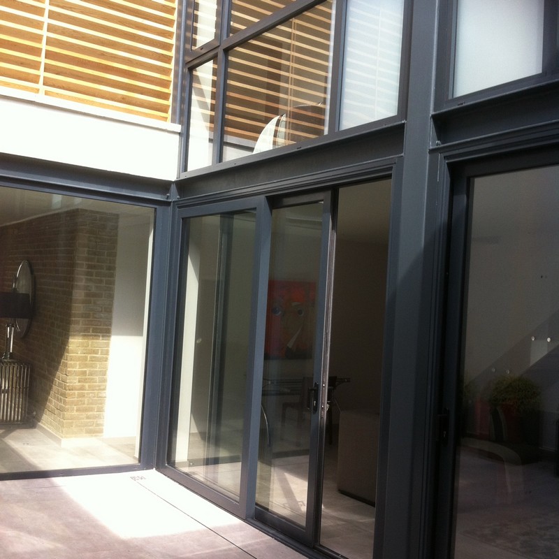 Anthracite aluminium sliding patio doors fitted in Mill Hill